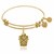 Expandable Yellow Tone Brass Bangle with Toto In A Basket Symbol